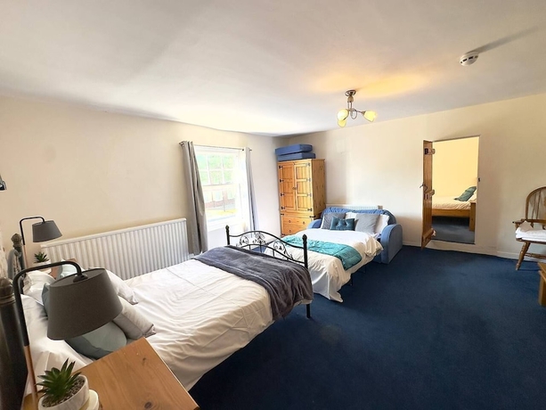 Imagen de la habitación del Hotel The George and Dragon Inn. Foto 18