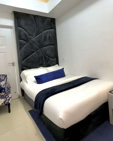 Imagen de la habitación del Hotel The Gibs. Foto 13