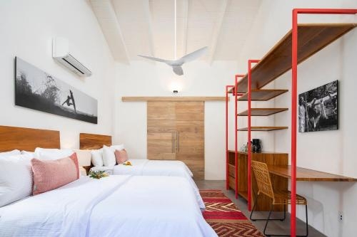 Imagen de la habitación del Hotel The Gilded Iguana. Foto 6