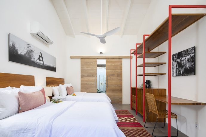 Imagen de la habitación del Hotel The Gilded Iguana Surf. Foto 2