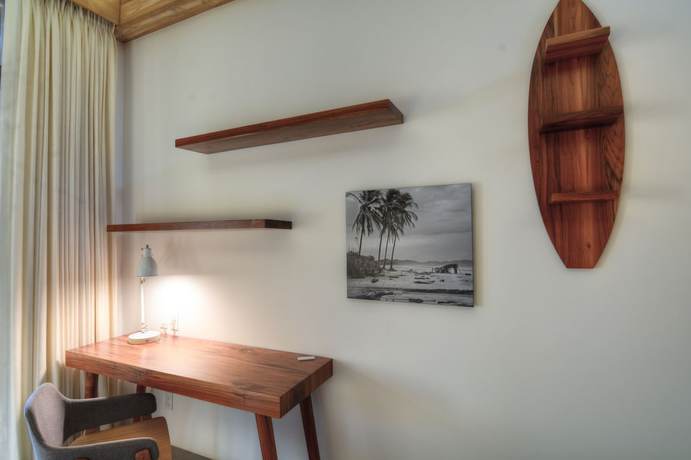 Imagen de la habitación del Hotel The Gilded Iguana Surf. Foto 4