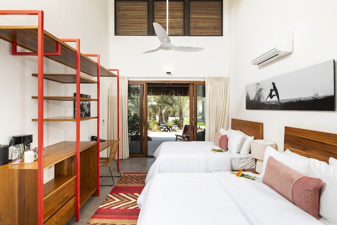 Imagen de la habitación del Hotel The Gilded Iguana Surf. Foto 9