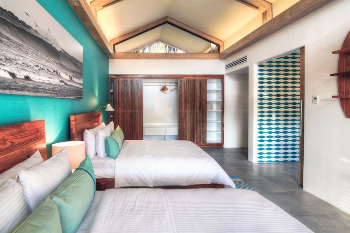 Imagen de la habitación del Hotel The Gilded Iguana Surf. Foto 14