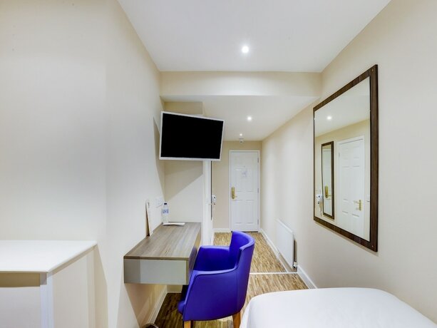 Imagen de la habitación del Hotel The Gissons. Foto 14