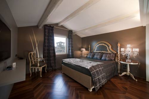 Imagen de la habitación del Hotel The Glam Boutique Hotel and Apt. Foto 3