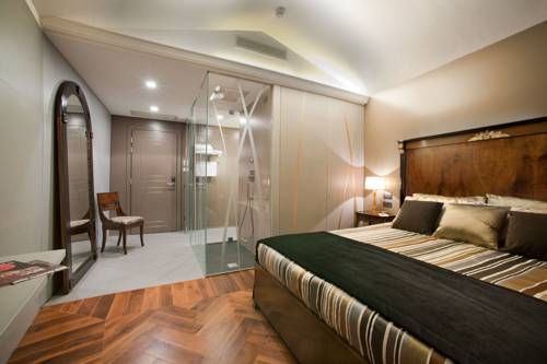 Imagen de la habitación del Hotel The Glam Boutique Hotel and Apt. Foto 4