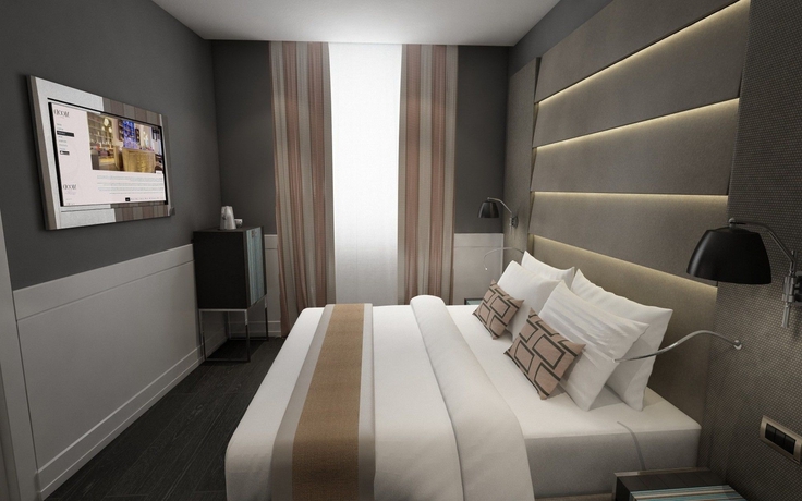 Imagen de la habitación del Hotel The Glam. Foto 8