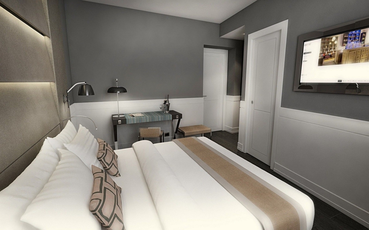 Imagen de la habitación del Hotel The Glam. Foto 10