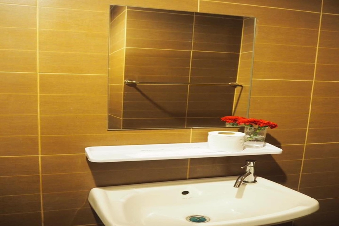 Imagen de la habitación del Hotel The Glasshouse Place. Foto 5
