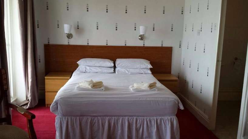 Imagen de la habitación del Hotel The Glastonbury. Foto 2