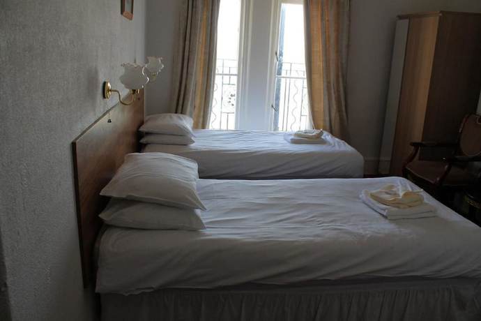 Imagen de la habitación del Hotel The Glastonbury. Foto 3