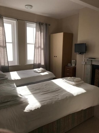 Imagen de la habitación del Hotel The Glastonbury. Foto 4