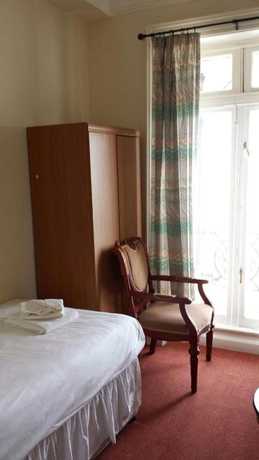 Imagen de la habitación del Hotel The Glastonbury. Foto 5