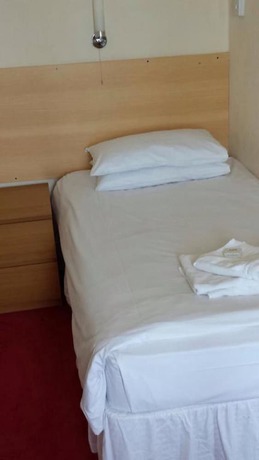 Imagen de la habitación del Hotel The Glastonbury. Foto 7