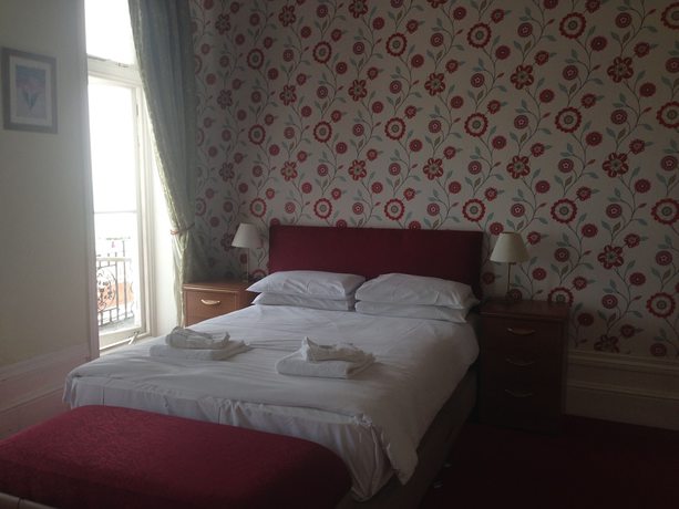 Imagen de la habitación del Hotel The Glastonbury. Foto 9