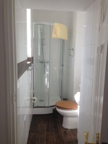 Imagen de la habitación del Hotel The Glastonbury. Foto 10