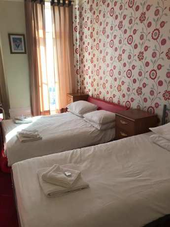 Imagen de la habitación del Hotel The Glastonbury. Foto 15