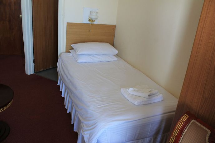 Imagen de la habitación del Hotel The Glastonbury. Foto 18