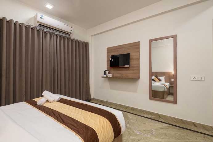Imagen de la habitación del Hotel The Gleam, Gurugram. Foto 4