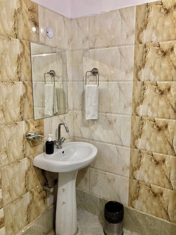 Imagen de la habitación del Hotel The Gleam, Gurugram. Foto 2