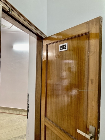 Imagen de la habitación del Hotel The Gleam, Gurugram. Foto 9