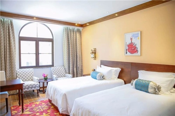 Imagen de la habitación del Hotel The Gleetour Shanghai. Foto 2