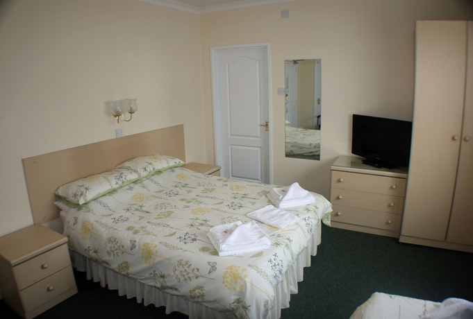 Imagen de la habitación del Hotel The Glendeveor. Foto 2