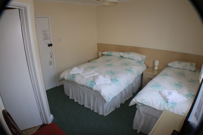 Imagen de la habitación del Hotel The Glendeveor. Foto 3