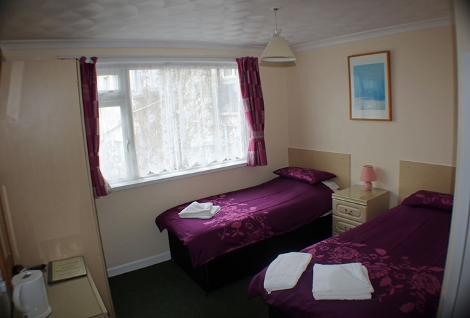 Imagen de la habitación del Hotel The Glendeveor. Foto 4