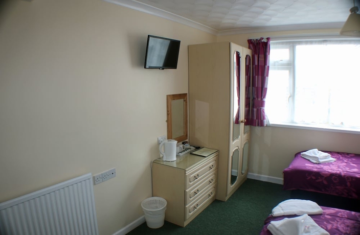 Imagen de la habitación del Hotel The Glendeveor. Foto 5