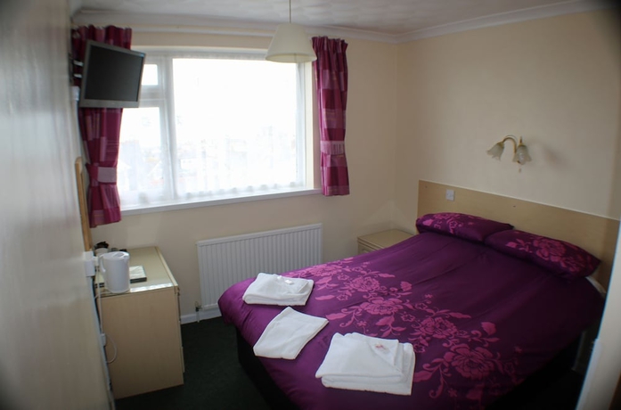 Imagen de la habitación del Hotel The Glendeveor. Foto 7
