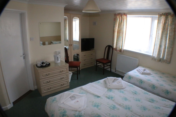 Imagen de la habitación del Hotel The Glendeveor. Foto 10