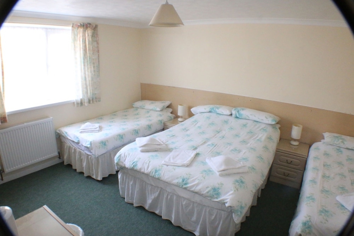 Imagen de la habitación del Hotel The Glendeveor. Foto 11