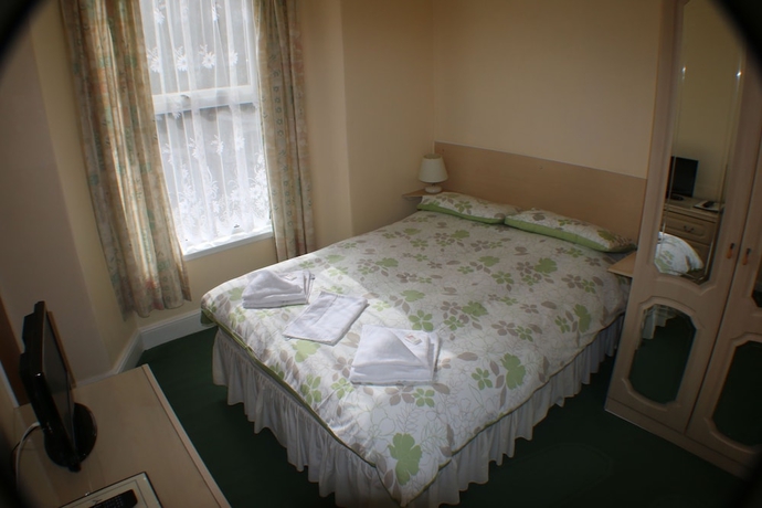 Imagen de la habitación del Hotel The Glendeveor. Foto 13
