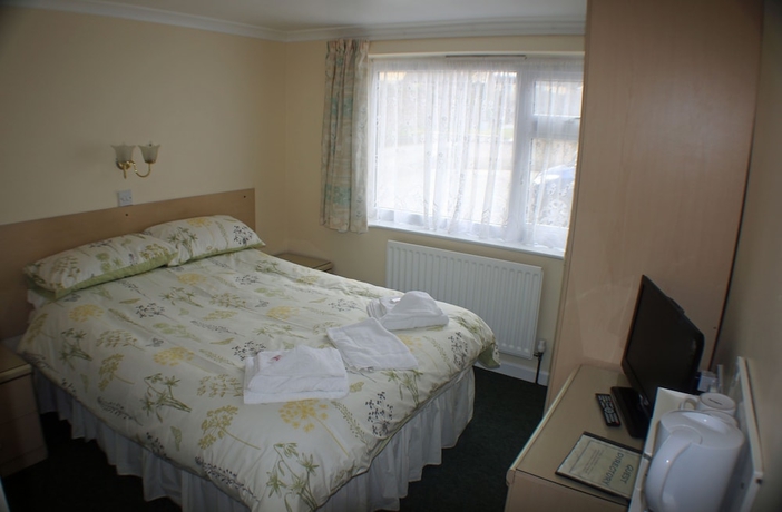 Imagen de la habitación del Hotel The Glendeveor. Foto 14