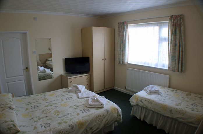 Imagen de la habitación del Hotel The Glendeveor. Foto 15