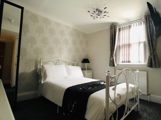 Imagen de la habitación del Hotel The Glenorleigh. Foto 9