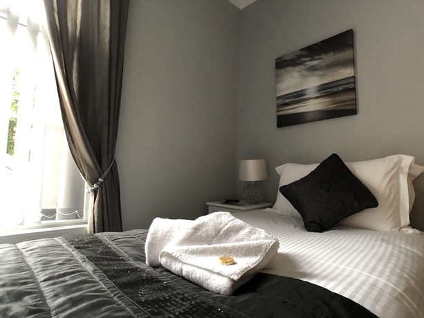 Imagen de la habitación del Hotel The Glenorleigh. Foto 10
