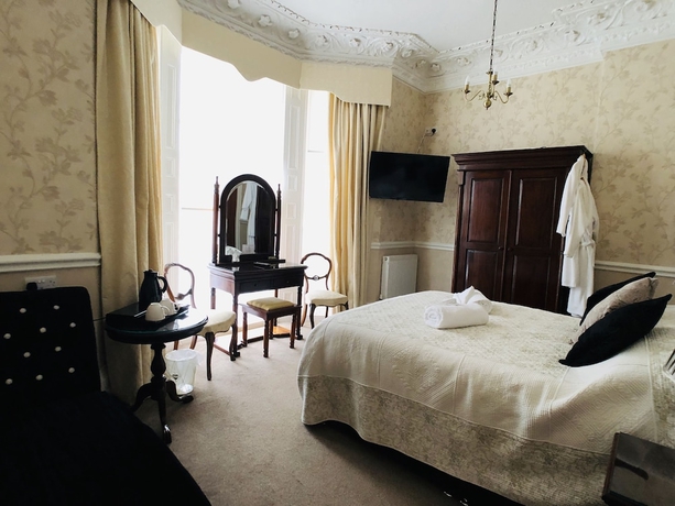 Imagen de la habitación del Hotel The Glenorleigh. Foto 13