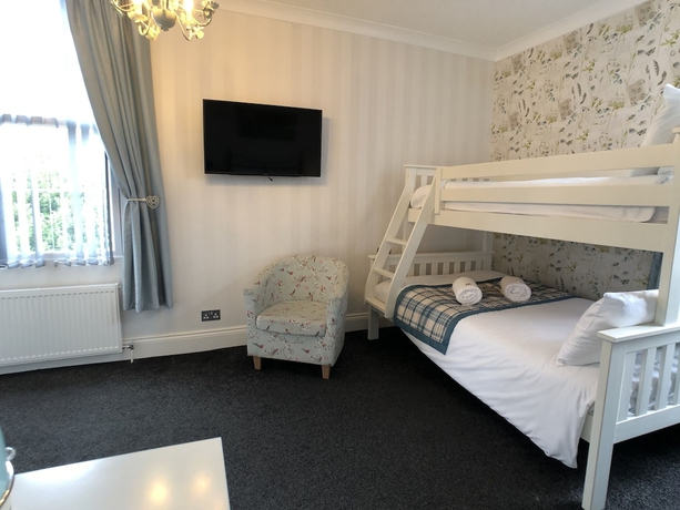 Imagen de la habitación del Hotel The Glenorleigh. Foto 14
