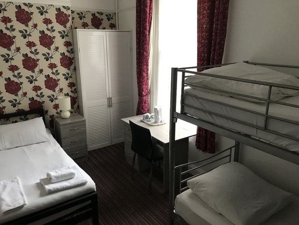 Imagen de la habitación del Hotel The Glenwood. Foto 4