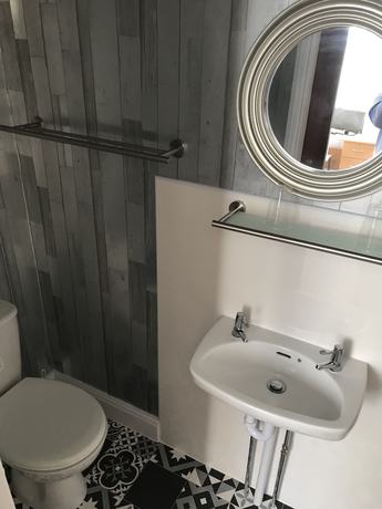 Imagen de la habitación del Hotel The Glenwood. Foto 6