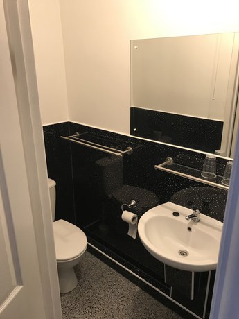 Imagen de la habitación del Hotel The Glenwood. Foto 7