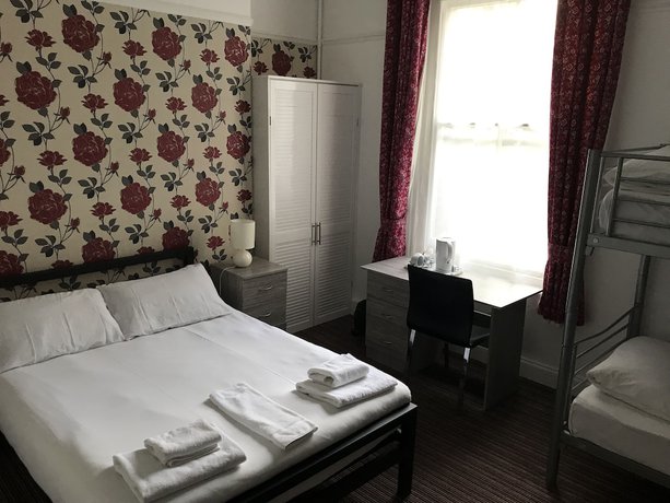 Imagen de la habitación del Hotel The Glenwood. Foto 9