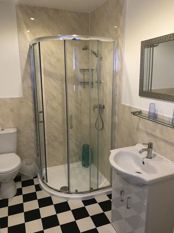 Imagen de la habitación del Hotel The Glenwood. Foto 11