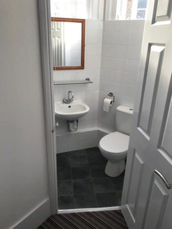 Imagen de la habitación del Hotel The Glenwood. Foto 14