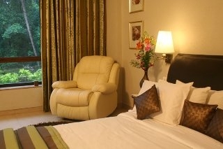 Imagen de la habitación del Hotel The Glitz Goa. Foto 8