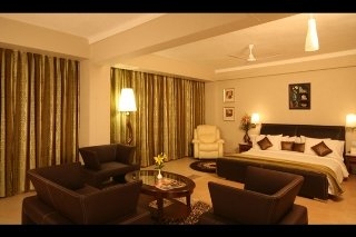 Imagen de la habitación del Hotel The Glitz Goa. Foto 13