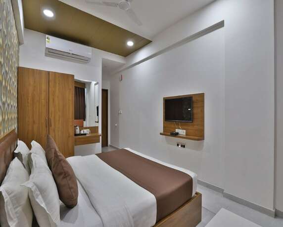 Imagen de la habitación del Hotel The Global Point. Foto 19
