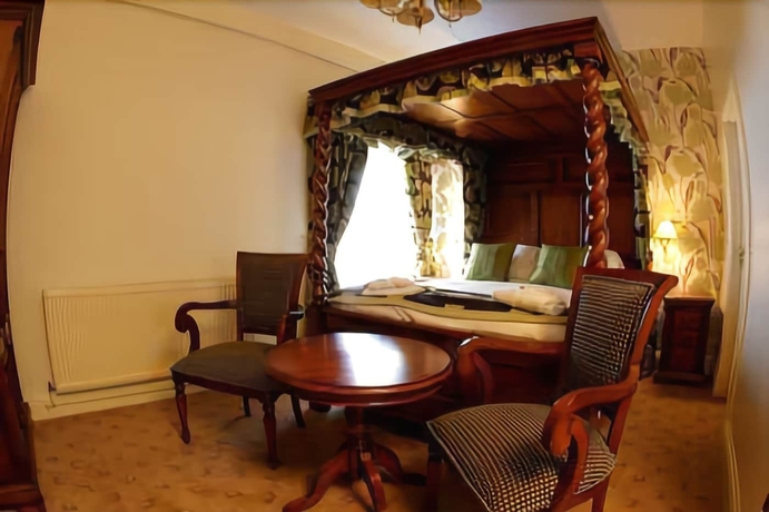 Imagen de la habitación del Hotel The Globe And Crown. Foto 16